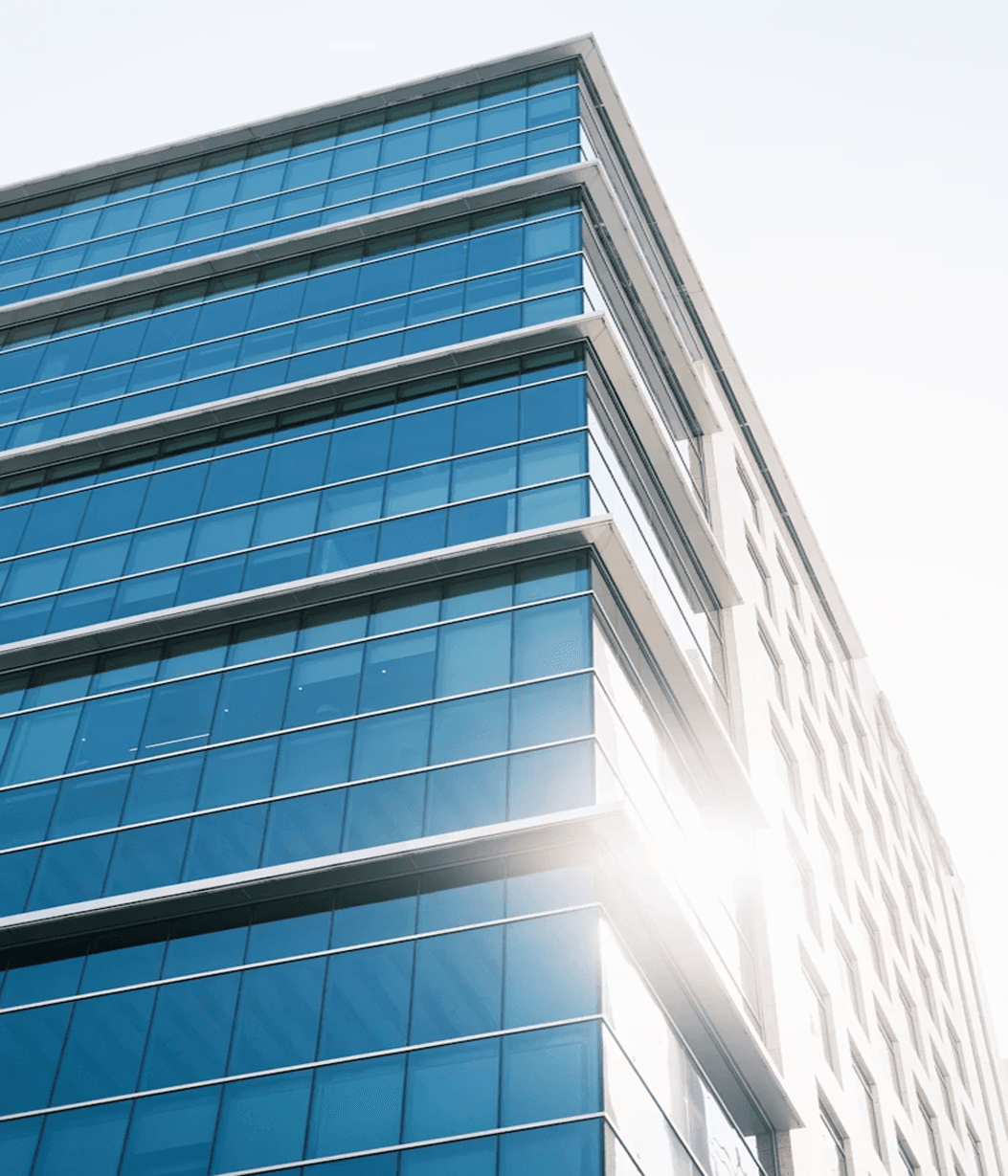 Blue glass curtain-walled commercial building facade